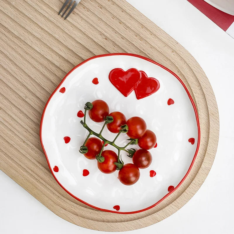 Tea pot decorated with a heart